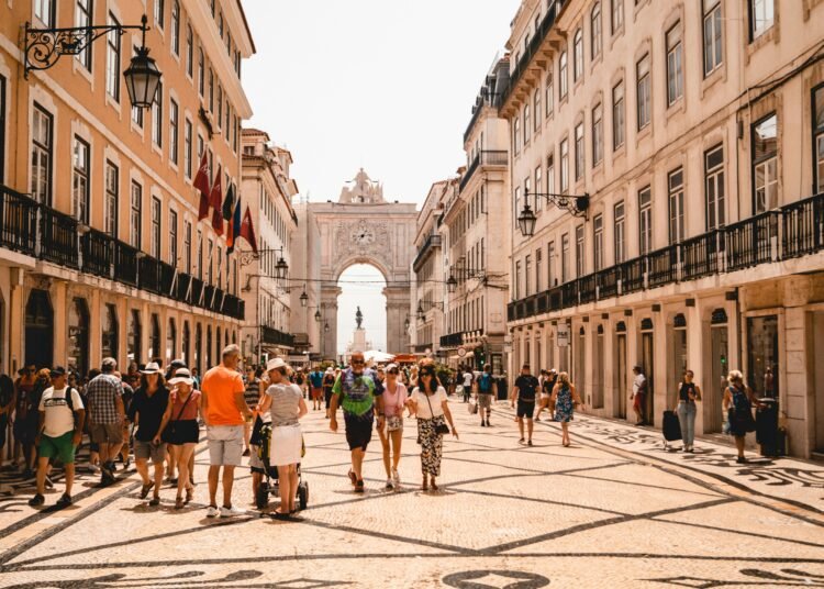 people walking on street near building during daytime