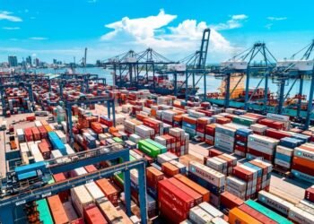 a large amount of containers are stacked on top of each other