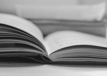 an open book sitting on top of a table