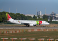 Embraer E190 airliner taxiing at Manises Airport in Valencia, Spain.