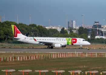 Embraer E190 airliner taxiing at Manises Airport in Valencia, Spain.