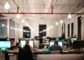 people sitting on chair in front of computer