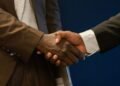 close up photo of shaking hands
