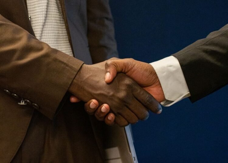 close up photo of shaking hands